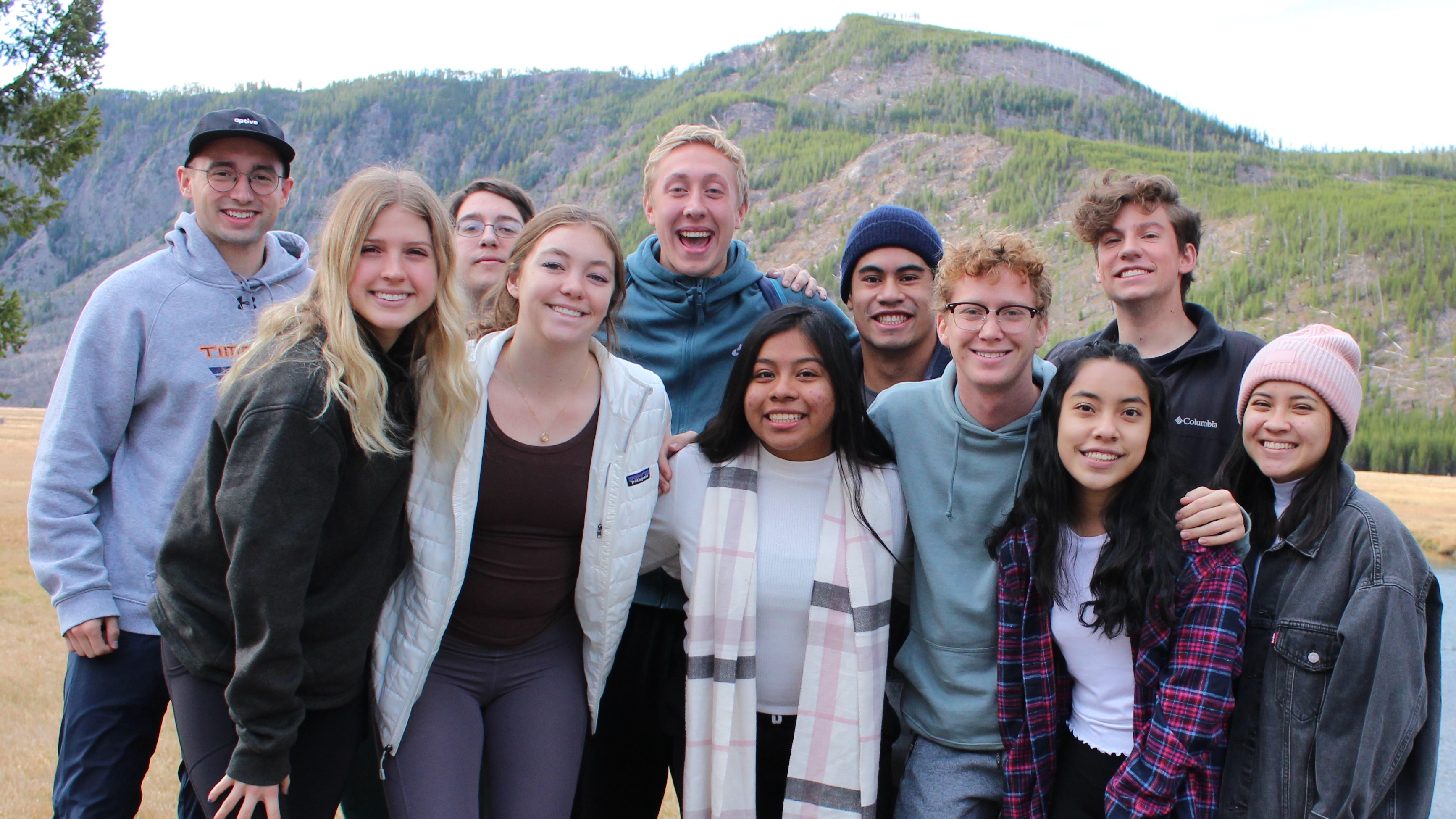 Quinn surrounded by his family of friends in Yellowstone